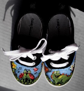 Painted child's sneakers