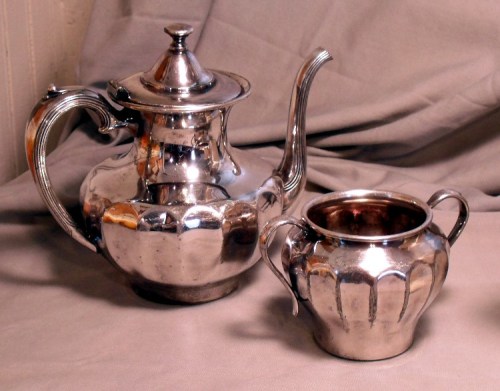 A flea market find, this silver teapot and sugar bowl cost less than $10.