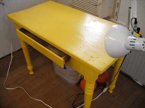 Small table for still lifes.  I meant to refinish this but the yellow has grown on me.