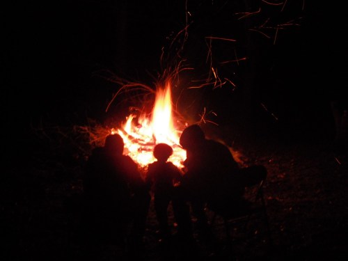 How long have humans been gathering around a campfire?
