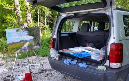 Car studio.  Easier than packing everything and a lot roomier.